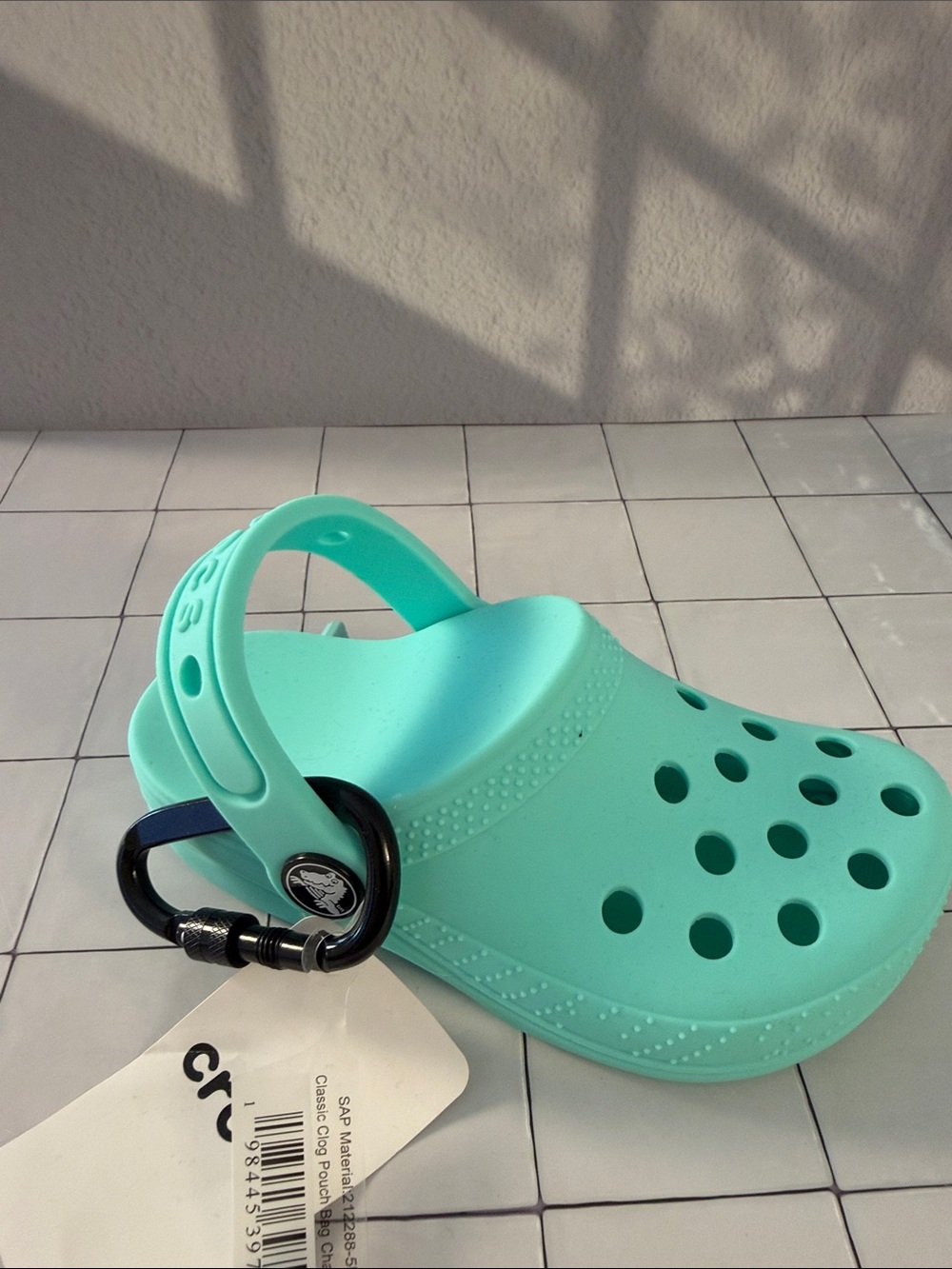 CROCS Classic Clog in Mint Green with Navy Accent